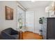 Bright bedroom with a window with detail, and seating area at 424 S Pennsylvania St, Denver, CO 80209