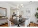 Well-lit dining room with stylish decor, opening to the kitchen area at 424 S Pennsylvania St, Denver, CO 80209