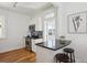 Cozy kitchen with a breakfast bar and stainless steel oven range at 424 S Pennsylvania St, Denver, CO 80209