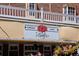 Exterior view of Lucile's Creole Cafe with sign and architectural details at 424 S Pennsylvania St, Denver, CO 80209