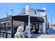 View of Pho Haus restaurant featuring lion statues and architectural details at 424 S Pennsylvania St, Denver, CO 80209