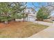 Two-story home featuring a two-car garage and mature landscaping at 20308 E 46Th Ave, Denver, CO 80249