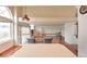 Spacious living room with hardwood floors viewed from above, offering an open floorplan and bright lighting at 20308 E 46Th Ave, Denver, CO 80249