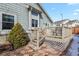 The deck is accessed via wooden stairs and offers outdoor living space at 20500 E Hamilton Ave, Aurora, CO 80013