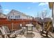 An outdoor deck offers space for seating and entertaining in a backyard setting at 20500 E Hamilton Ave, Aurora, CO 80013