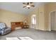 Large main bedroom featuring neutral walls and an ensuite bathroom with a soaking tub at 20500 E Hamilton Ave, Aurora, CO 80013