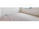 Neutral bedroom with soft carpet and a bright window with city views at 457 Interlocken Blvd # 105, Broomfield, CO 80021
