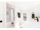 Simple bathroom with a bathtub, shower, and updated vanity at 2478 S Lafayette St, Denver, CO 80210