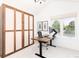 Home office with built-in wall bed and plenty of natural light at 2478 S Lafayette St, Denver, CO 80210