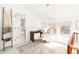 Bedroom with a desk and chair, crib, and access to a bathroom at 2478 S Lafayette St, Denver, CO 80210