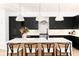 Modern kitchen with white quartz countertops and black cabinetry at 2478 S Lafayette St, Denver, CO 80210