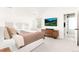 Spacious main bedroom with ensuite bathroom and large window at 2478 S Lafayette St, Denver, CO 80210