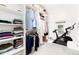 Spacious walk-in closet with ample shelving and a Peloton at 2478 S Lafayette St, Denver, CO 80210