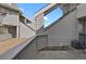 A quaint townhouse complex with neutral siding and landscaped grounds at 17034 E Tennessee Dr # 106, Aurora, CO 80017