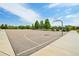 Community outdoor basketball court is available for friendly games on a sunny day at 2682 E 161St Pl, Thornton, CO 80602