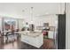 Spacious kitchen featuring an island, stainless steel appliances, and pendant lighting at 2682 E 161St Pl, Thornton, CO 80602