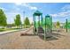 Community playground featuring slides, climbing structures, and a soft landing surface for safe play at 2682 E 161St Pl, Thornton, CO 80602