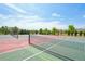 Well maintained community tennis courts are easily accessed by residents with beautiful blue skies at 2682 E 161St Pl, Thornton, CO 80602