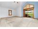 Spacious main bedroom with vaulted ceilings and sliding glass door to a deck at 15851 Deer Ridge Dr, Morrison, CO 80465