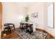 Cozy office space with natural light, a modern desk, and elegant decor at 15851 Deer Ridge Dr, Morrison, CO 80465