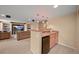 A basement bar and living area featuring seating, a mini fridge, and a sink at 1120 N Calhan Ave, Castle Rock, CO 80104