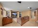 A basement living room featuring built-in bookshelves and a large screen entertainment center at 1120 N Calhan Ave, Castle Rock, CO 80104