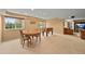 A large basement recreation area with space for games, dining, and entertaining at 1120 N Calhan Ave, Castle Rock, CO 80104