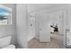Clean bathroom with shower and view of bedroom at 22022 E 38Th Pl, Aurora, CO 80019