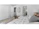 Well-lit bedroom with walk-in closet and ensuite at 22022 E 38Th Pl, Aurora, CO 80019