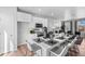 Modern kitchen with island, stainless steel appliances, and white cabinetry at 22022 E 38Th Pl, Aurora, CO 80019