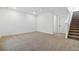 Finished basement with staircase, new carpet, and ample open space at 39730 Congress Ln, Elizabeth, CO 80107