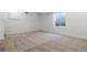 Spacious finished basement featuring new carpet and a window at 39730 Congress Ln, Elizabeth, CO 80107