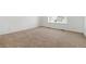 Large bedroom featuring neutral carpet, white walls and one window at 39730 Congress Ln, Elizabeth, CO 80107