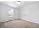 Bright bedroom with sliding closet doors and a large window providing natural light at 39730 Congress Ln, Elizabeth, CO 80107