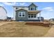 New construction showcasing an exterior with modern design, backyard, and neutral color palette at 39730 Congress Ln, Elizabeth, CO 80107