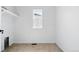 Bright laundry room with window and ample space at 39730 Congress Ln, Elizabeth, CO 80107