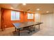 Finished basement featuring a ping pong table, offering a fun and recreational space for entertainment at 7169 S Grape Ln, Centennial, CO 80122
