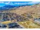 Panoramic aerial view of a residential area with mountains in the backdrop at 4921 Fountain St, Boulder, CO 80304