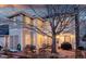 Backyard patio area with outdoor seating and barbecue, perfect for entertaining at dusk at 4921 Fountain St, Boulder, CO 80304