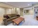 Finished basement featuring a cozy seating area with plush sofa and plenty of space at 4921 Fountain St, Boulder, CO 80304