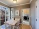 Bright dining area with a table, chairs, a sliding glass door and views of the landscaped backyard at 4921 Fountain St, Boulder, CO 80304