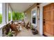 Inviting front porch with seating area, perfect for relaxing and enjoying the outdoors at 4921 Fountain St, Boulder, CO 80304