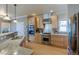 Modern kitchen with stainless steel appliances, granite countertops, and custom cabinetry at 4921 Fountain St, Boulder, CO 80304