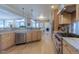 Spacious kitchen with stainless steel appliances, granite countertops and wooden cabinets at 4921 Fountain St, Boulder, CO 80304