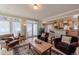 Bright living room featuring hardwood floors, lots of natural light, and a seamless flow to the kitchen at 4921 Fountain St, Boulder, CO 80304