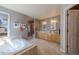 Bright bathroom with a soaking tub, double vanity, and a separate glass shower at 4921 Fountain St, Boulder, CO 80304