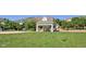 Community park features a green lawn, shaded picnic area, and playground at 4921 Fountain St, Boulder, CO 80304