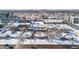 Aerial view of residential neighborhood with property highlighted, snow-covered in winter at 1435 Quebec St, Denver, CO 80220