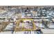 Aerial view of a house and lot in a residential neighborhood at 1435 Quebec St, Denver, CO 80220