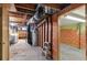 Unfinished basement with laundry and storage areas at 1435 Quebec St, Denver, CO 80220